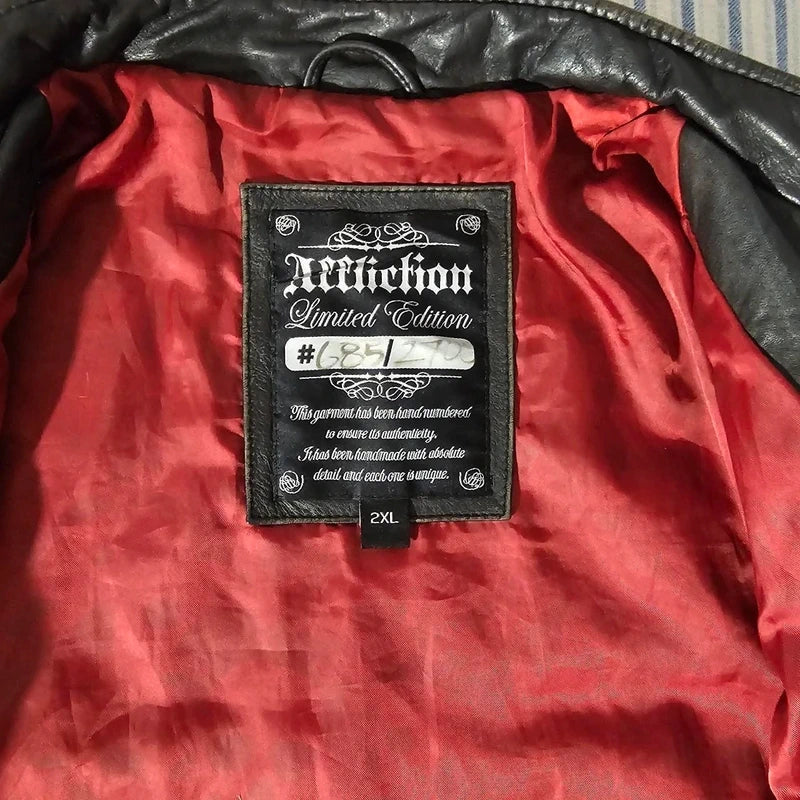 Affliction black leather jacket with red lining and cross design